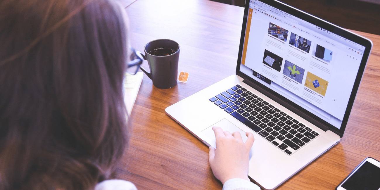 a woman researching pest control marketing plans